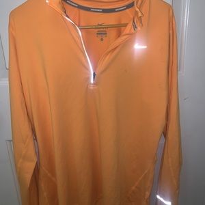 orange nike running zip up